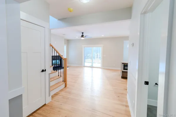 a kitchen with kitchen island a sink counter top space and stainless steel appliances