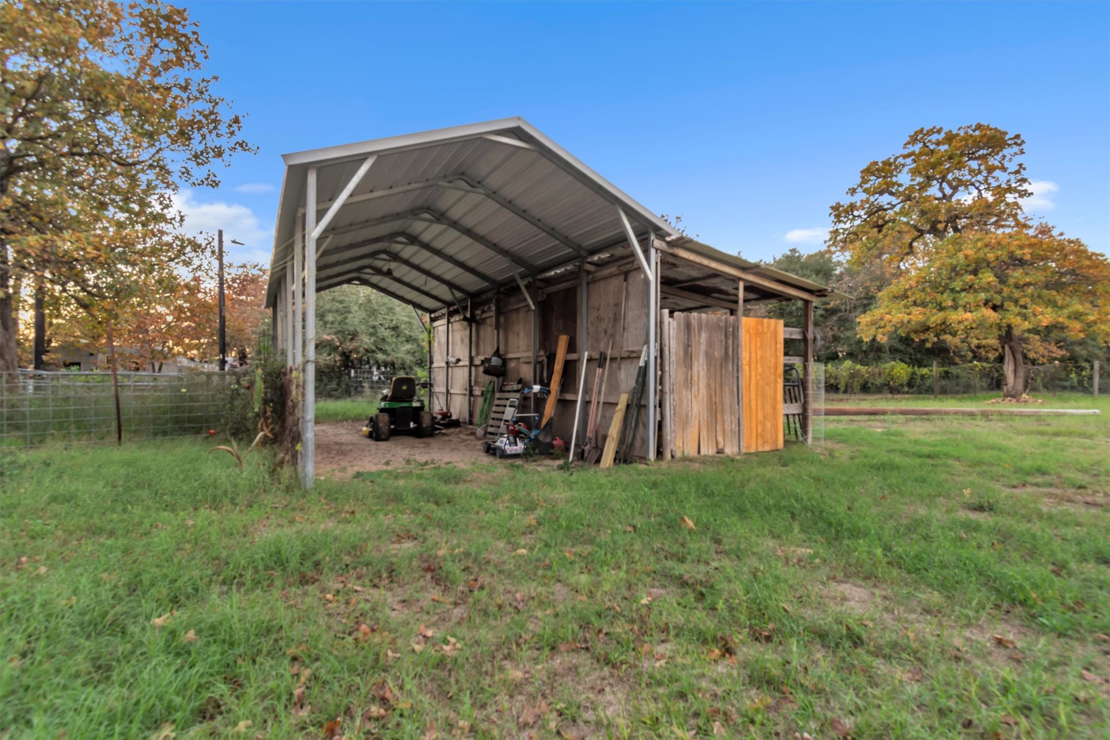 149 Wayside Drive Elgin, TX 78621 - Photo 14 of 24 View of outdoor structure with a detached carport