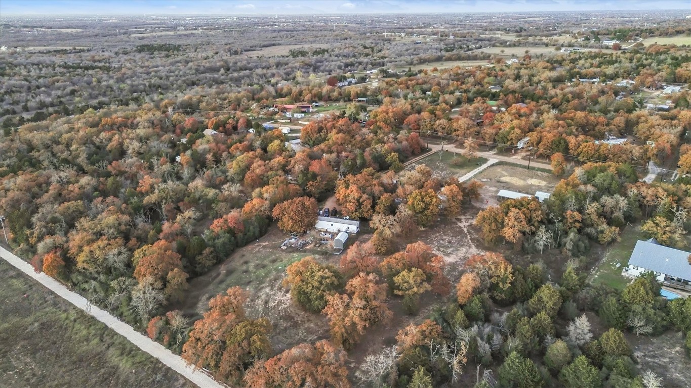 146 Wayside Drive Elgin, TX 78621 - Photo 16 of 24 Aerial view of property's location featuring a forest