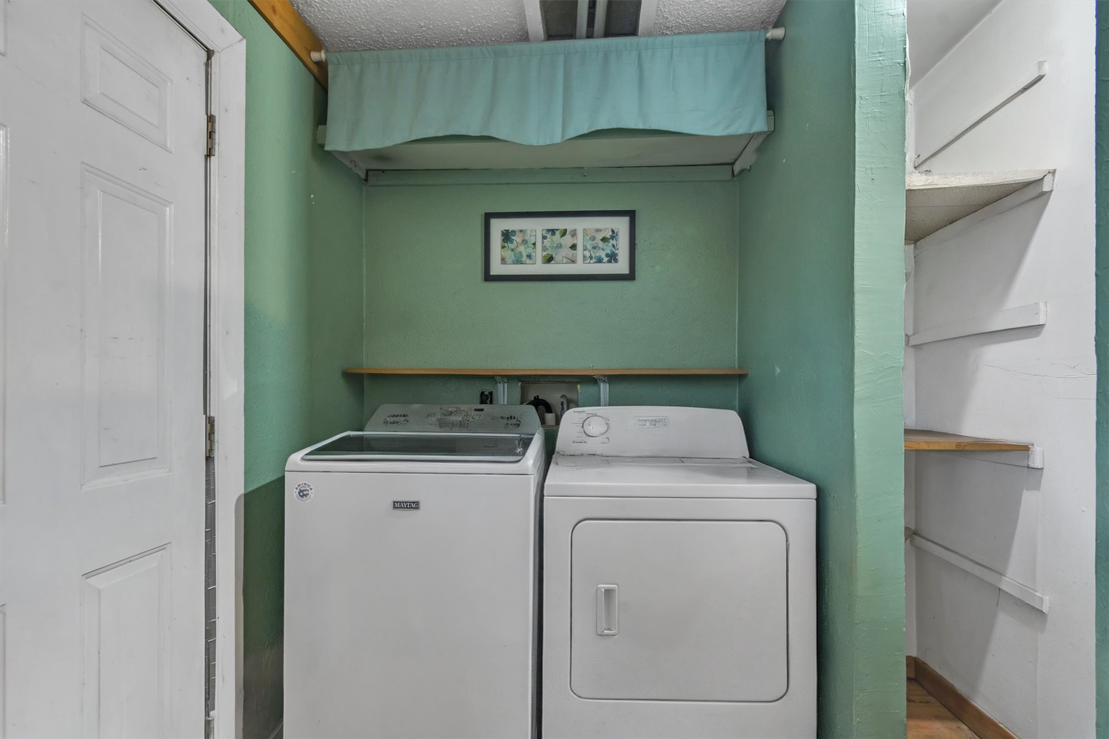 149 Wayside Drive Elgin, TX 78621 - Photo 6 of 24 Laundry area with washer and dryer