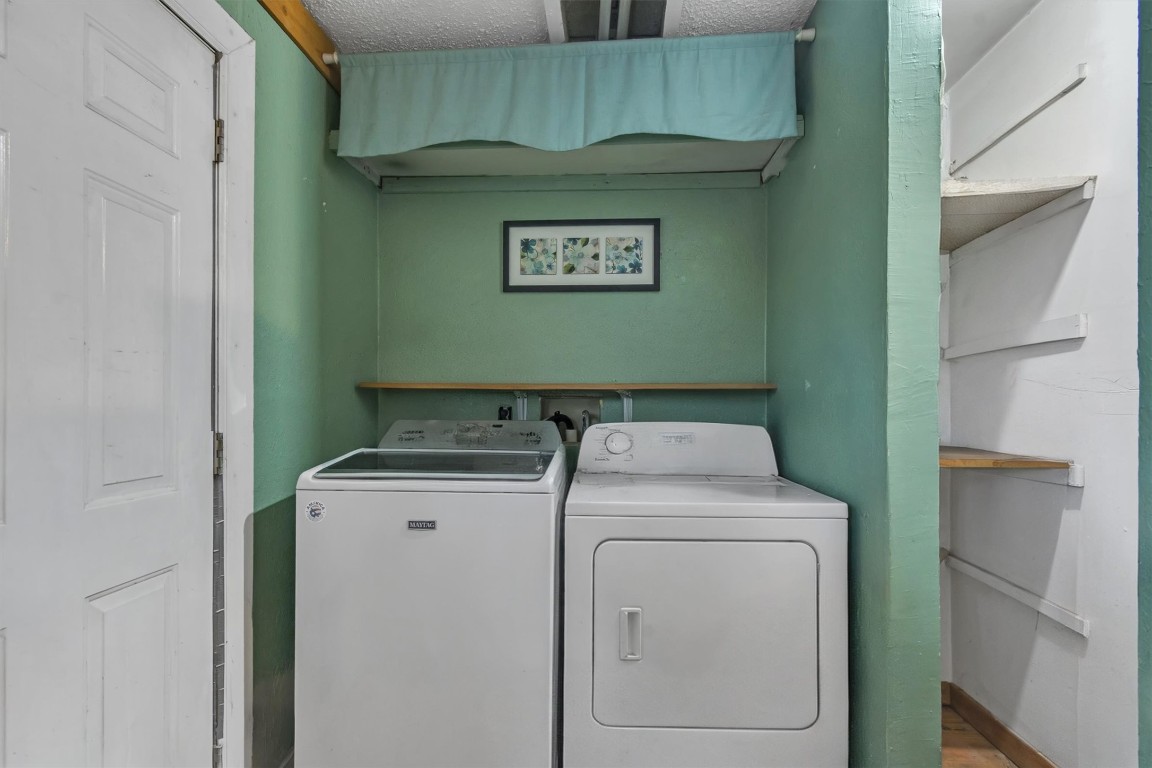146 Wayside Drive Elgin, TX 78621 - Photo 6 of 24 Laundry area with washer and dryer