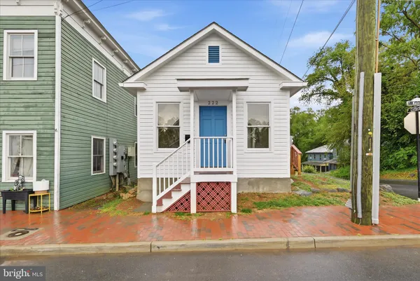 front view of a house with a small yard