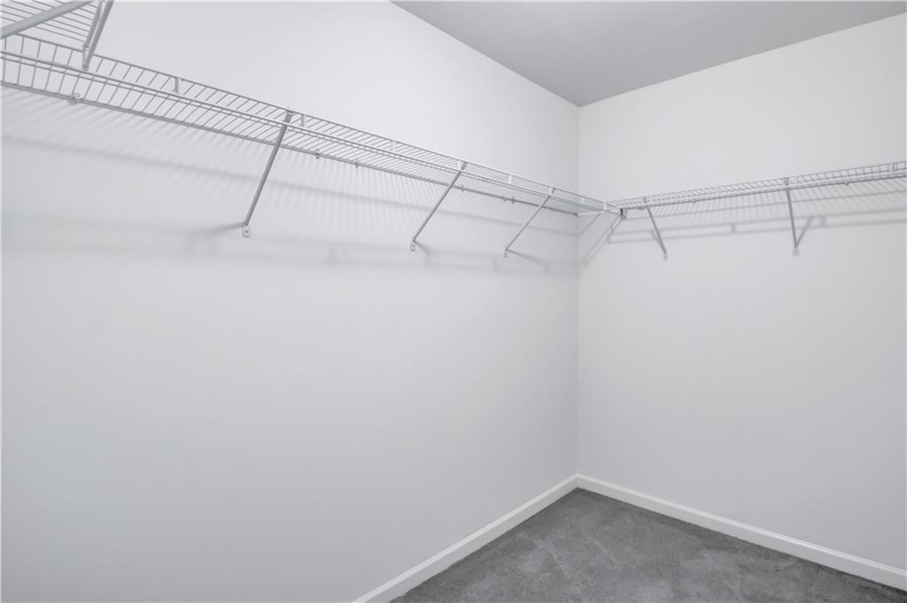 330 Avalon Square Fairburn, GA 30213 - Photo 28 of 52 a view of a room with racks on the wall