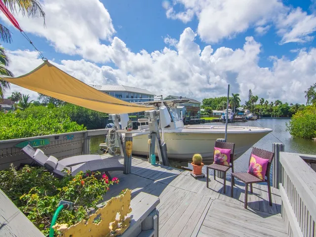 a view of a patio with furniture