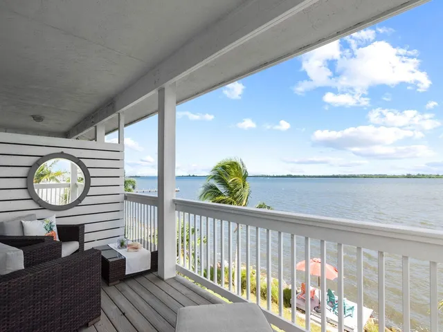 a view of a porch with furniture