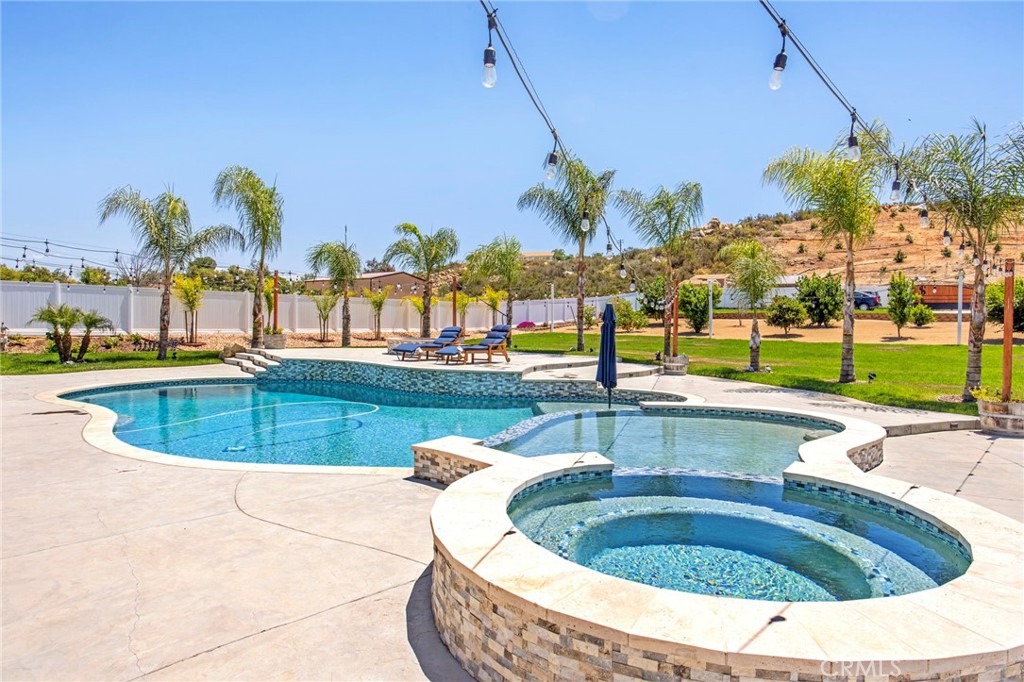 32797 Hayden Road Menifee, CA 92584 - Photo 32 of 51 a view of swimming pool with outdoor seating and yard