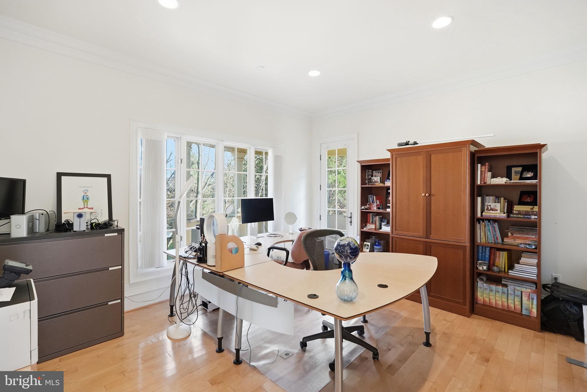 8537 Rapley Preserve Circle Potomac, MD 20854 - Photo 14 of 40 a living room with furniture and a flat screen tv