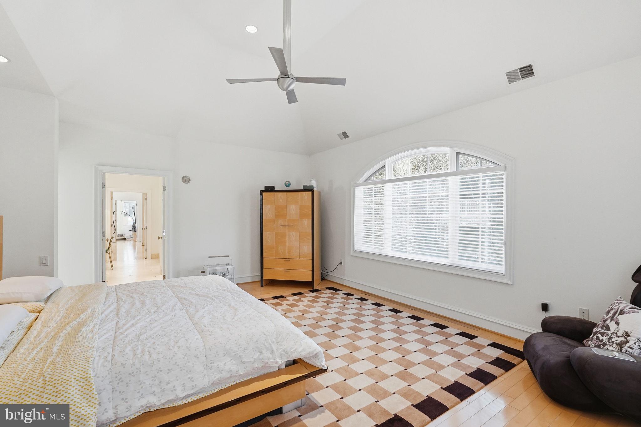 8537 Rapley Preserve Circle Potomac, MD 20854 - Photo 16 of 40 a bedroom with a bed and a window