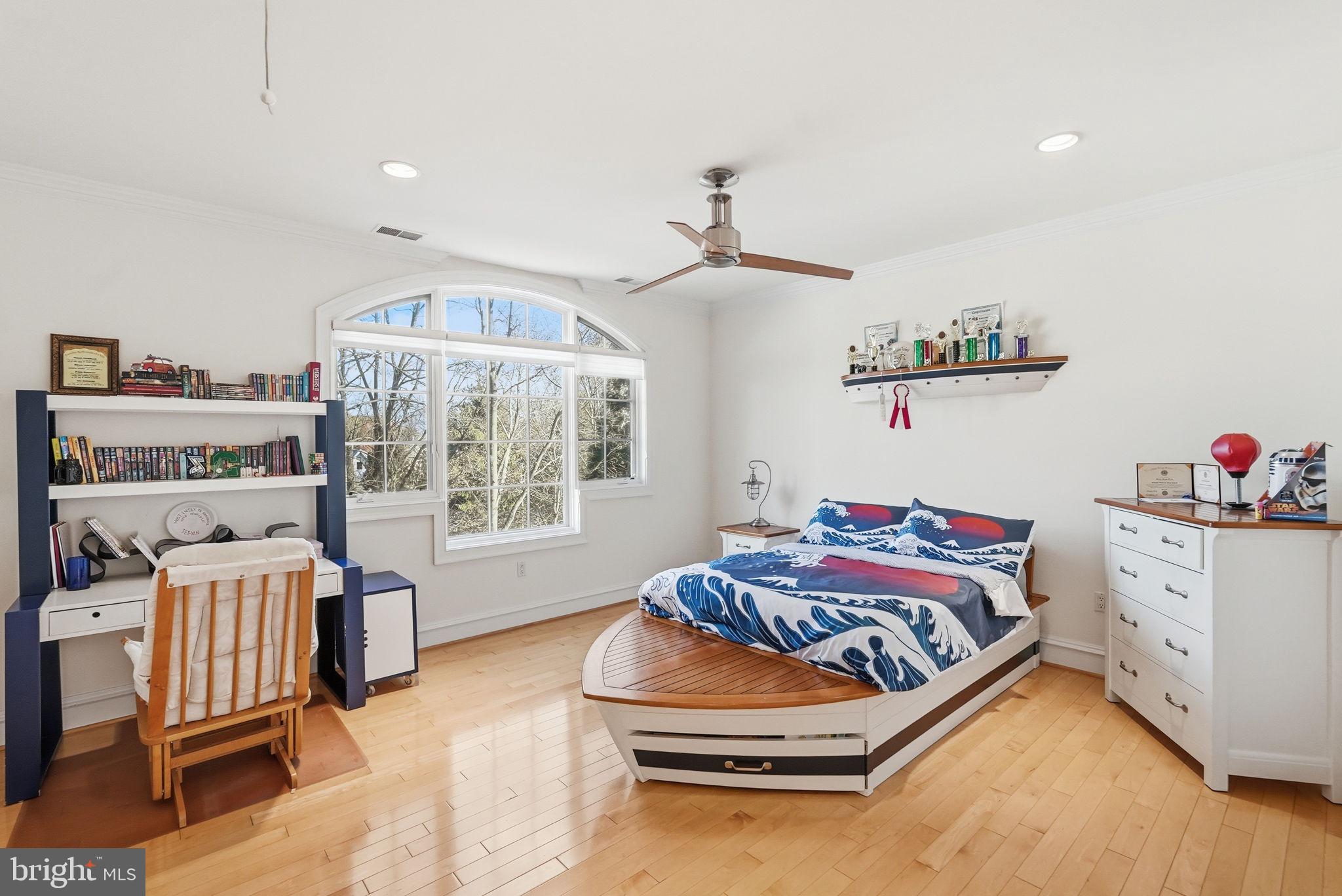 8537 Rapley Preserve Circle Potomac, MD 20854 - Photo 22 of 40 a bedroom with furniture and a window