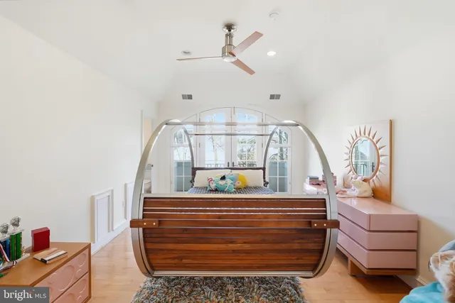 a bathroom with a sink vanity and a mirror