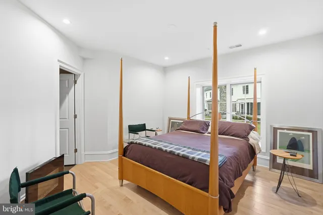 a view of a porch with furniture and garden