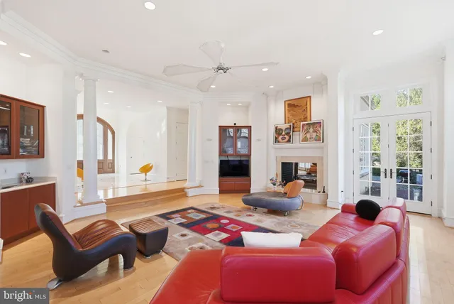 a kitchen with stainless steel appliances granite countertop a sink and a refrigerator