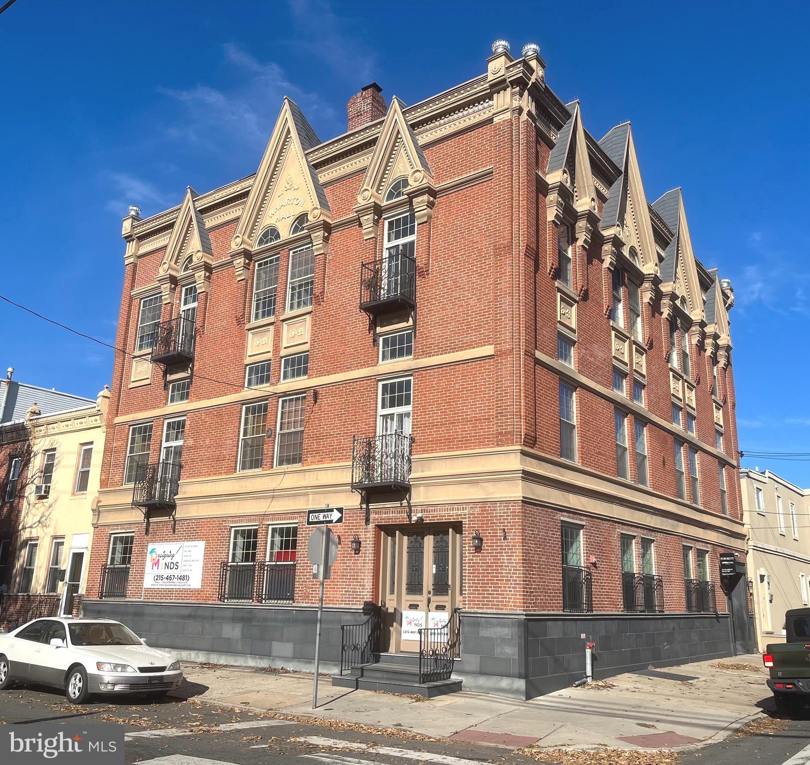 1268 South 26th Street, Unit 3E Philadelphia, PA 19146 - Photo 1 of 13 a view of a building with a street