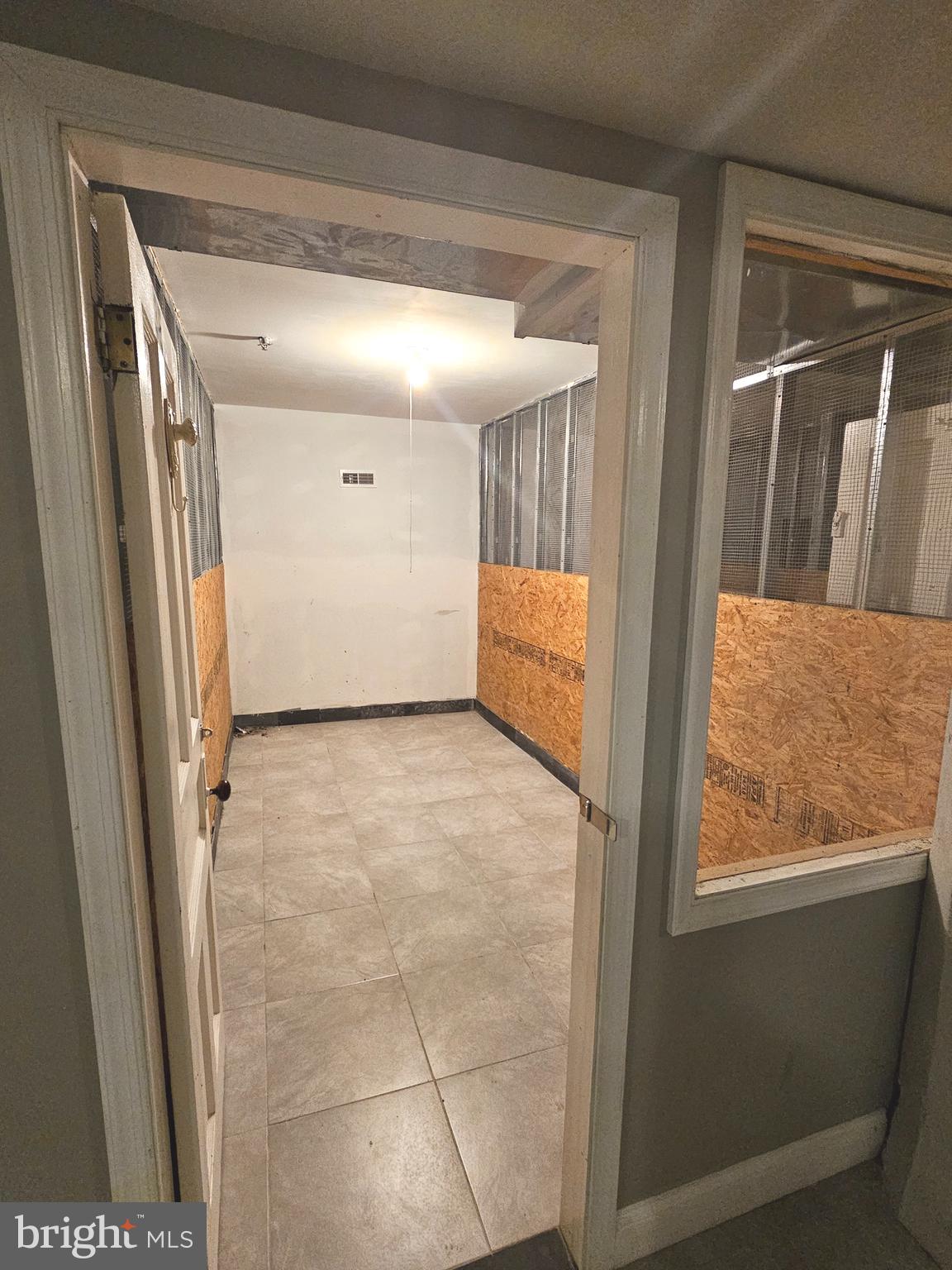 1268 South 26th Street, Unit 3E Philadelphia, PA 19146 - Photo 13 of 13 a view of an empty room and window