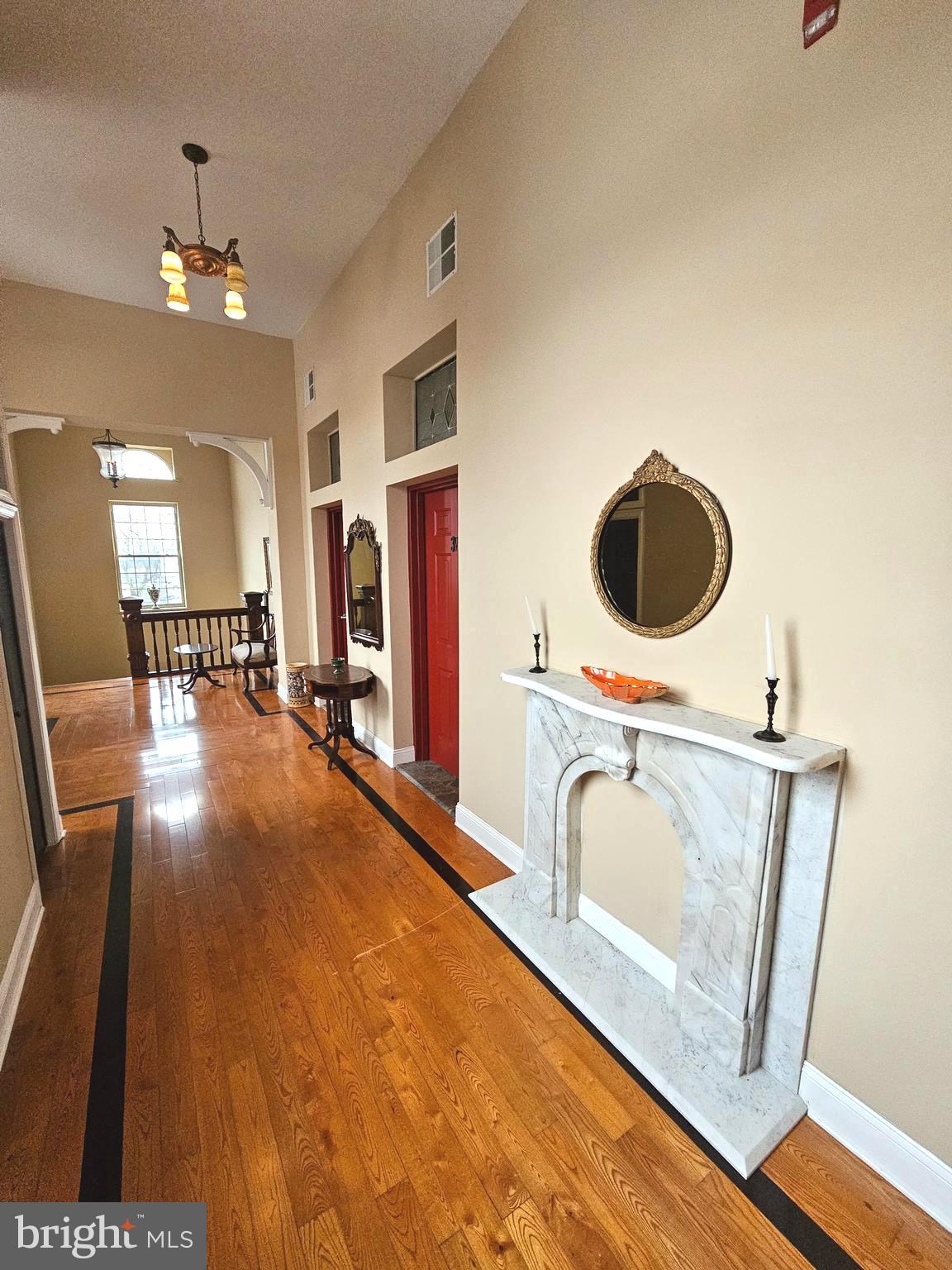 1268 South 26th Street, Unit 3E Philadelphia, PA 19146 - Photo 2 of 13 a view of a livingroom with a furniture and staircase