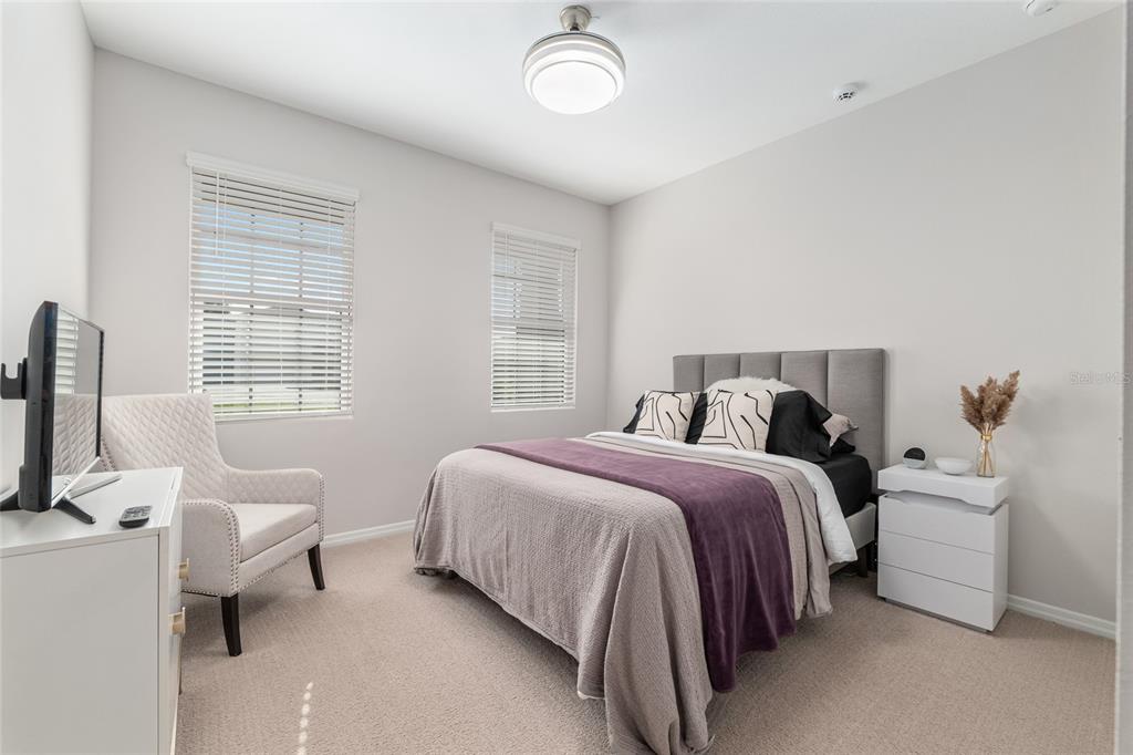 6243 Southwest 89th St Road Ocala, FL 34476 - Photo 15 of 57 a bedroom with a bed and a window