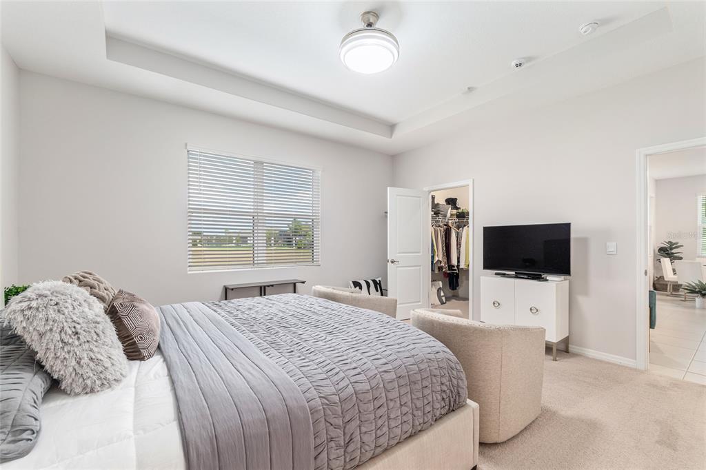 6243 Southwest 89th St Road Ocala, FL 34476 - Photo 24 of 57 a bedroom with a bed and a flat screen tv