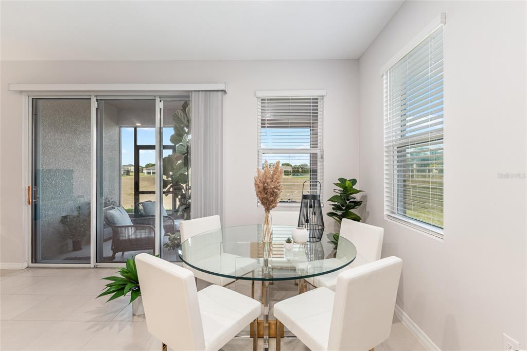 6243 Southwest 89th St Road Ocala, FL 34476 - Photo 34 of 57 a dining room with furniture and window
