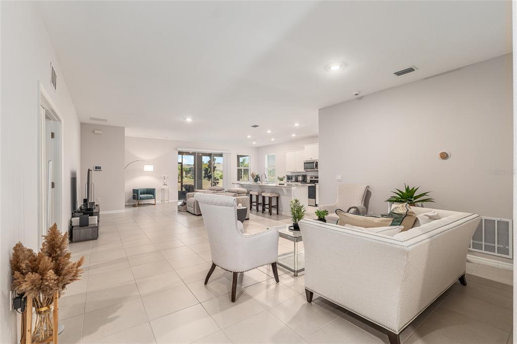 6243 Southwest 89th St Road Ocala, FL 34476 - Photo 8 of 57 a living room with furniture and a table