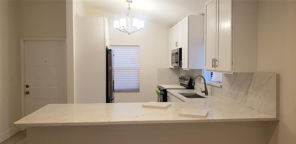 8166 Springtree Road, Unit A Boca Raton, FL 33496 - Photo 8 of 9 Kitchen