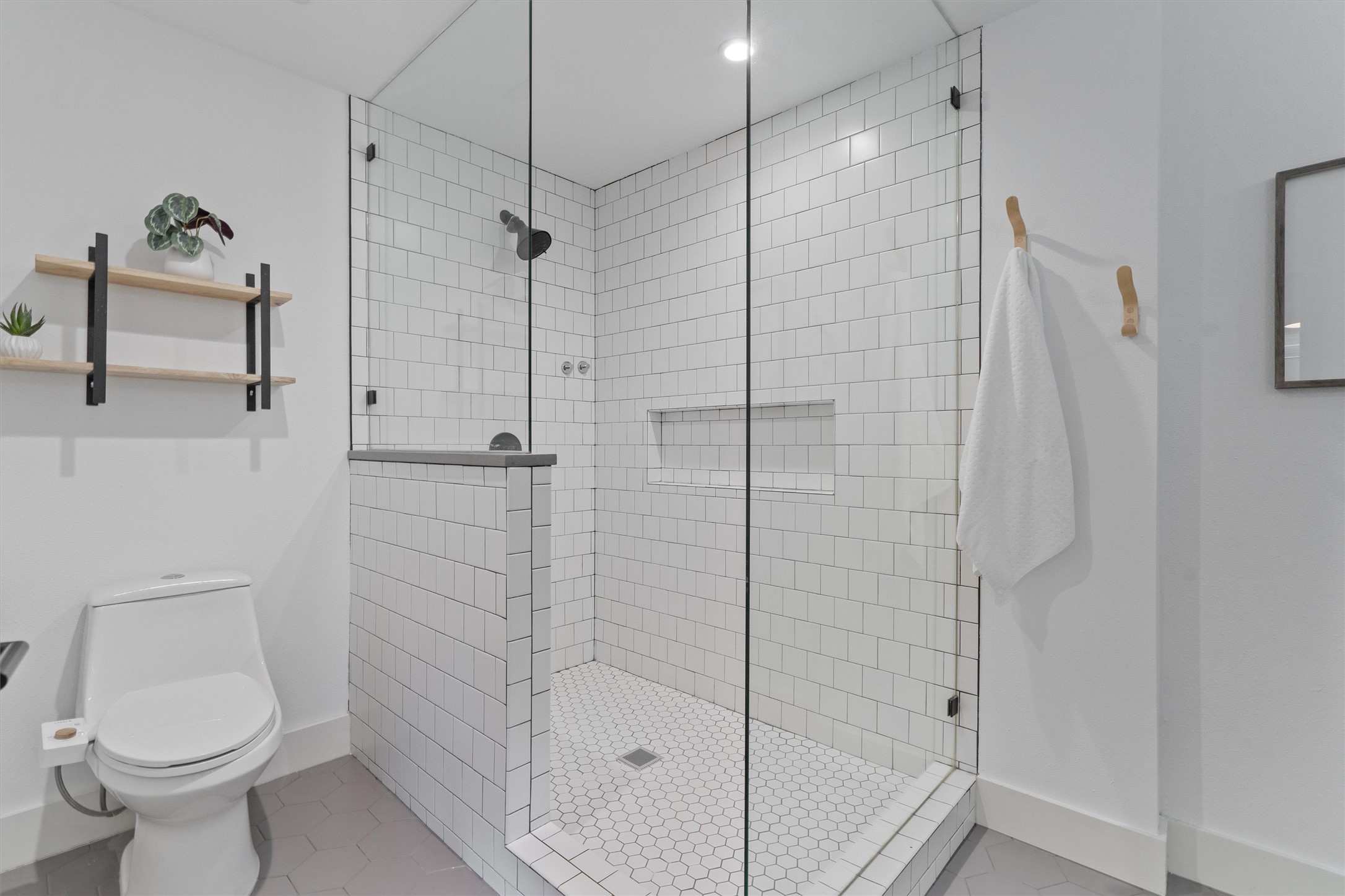 3306 Whiteway Drive Austin, TX 78757 - Photo 14 of 24 a bathroom with a toilet and a shower