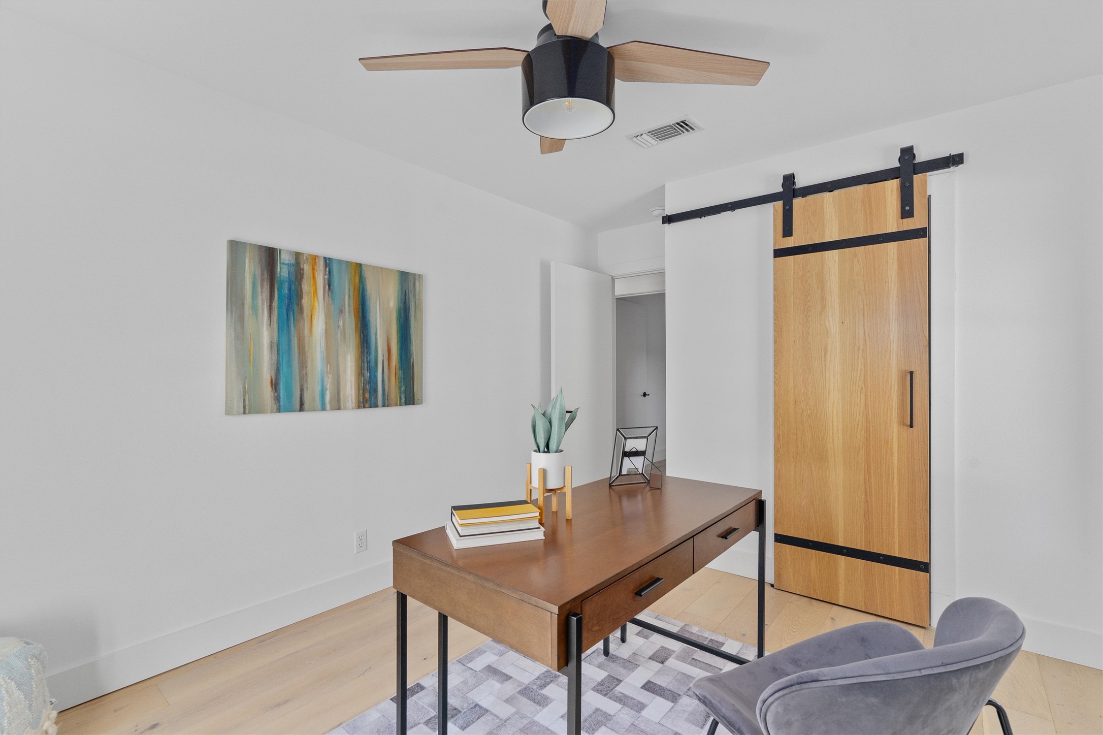 3306 Whiteway Drive Austin, TX 78757 - Photo 16 of 24 a view of a workspace with furniture
