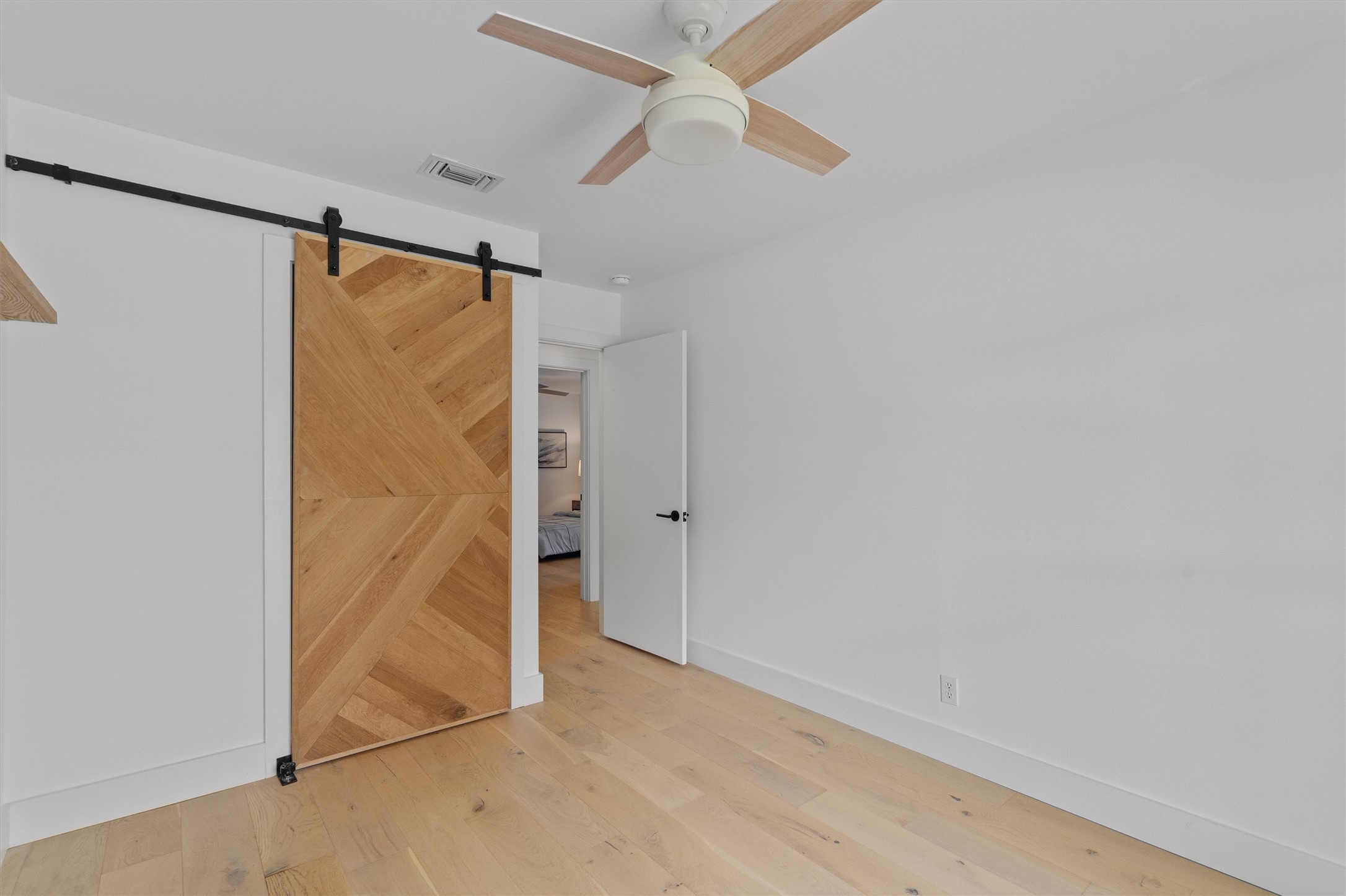 3306 Whiteway Drive Austin, TX 78757 - Photo 18 of 24 an empty room with a door