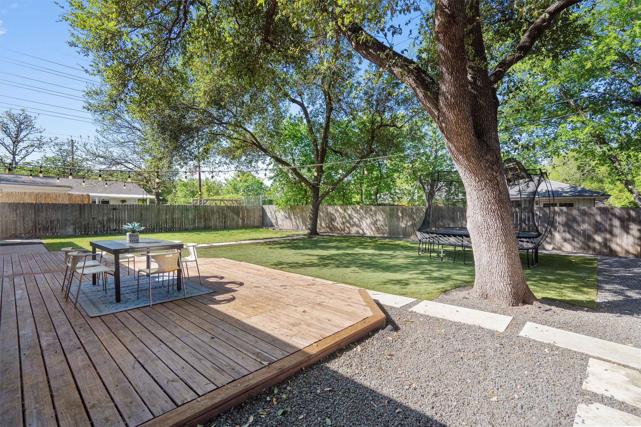 3306 Whiteway Drive Austin, TX 78757 - Photo 20 of 24 a view of a deck with chairs and a yard