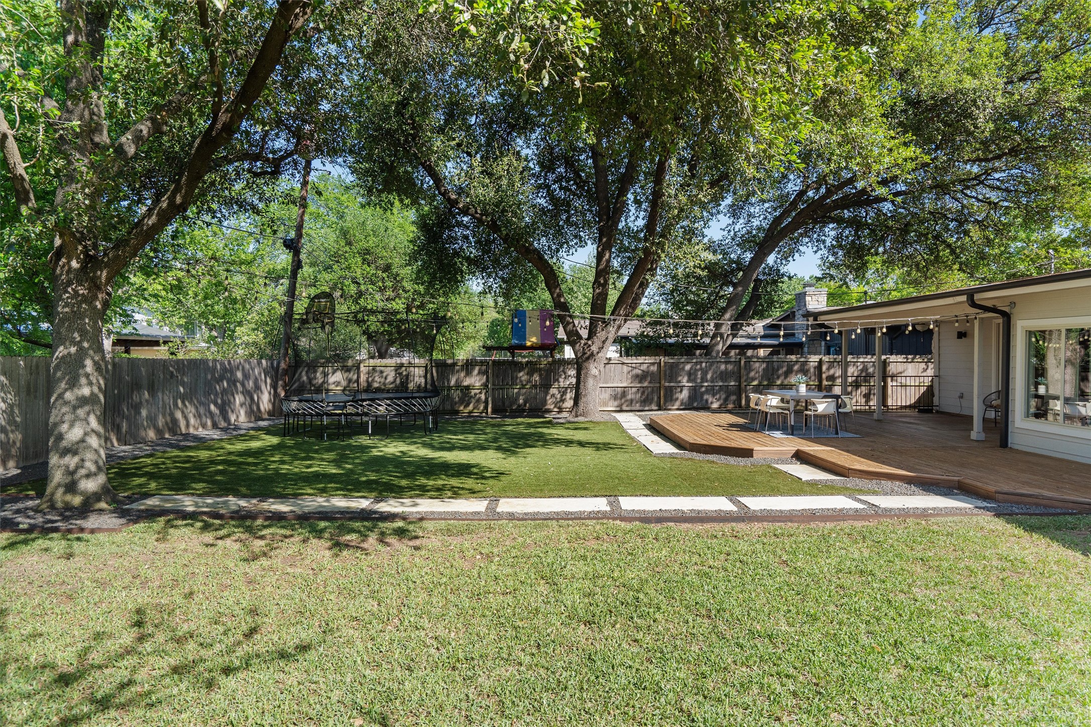 3306 Whiteway Drive Austin, TX 78757 - Photo 21 of 24 a view of a house with backyard and sitting area