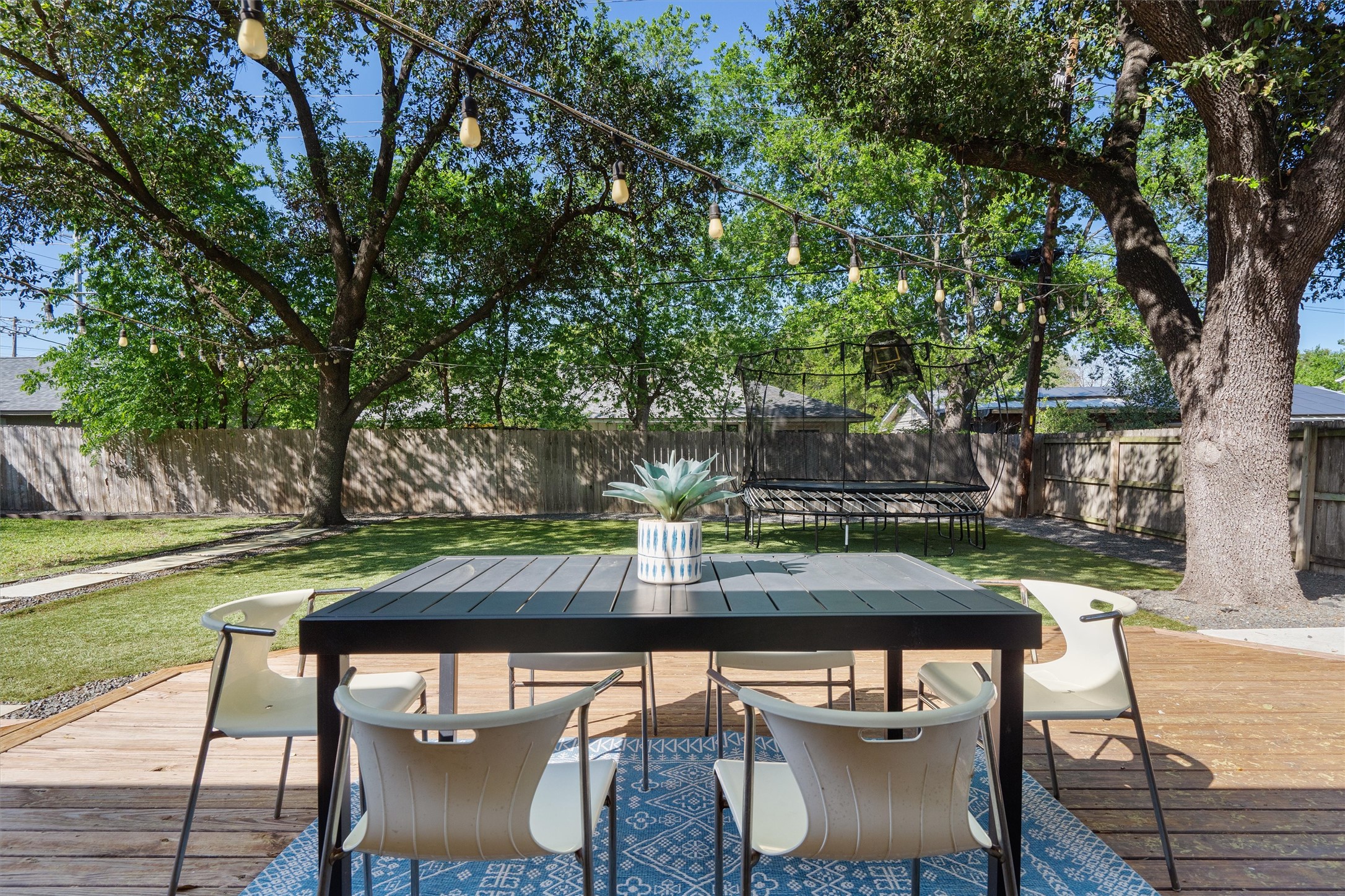 3306 Whiteway Drive Austin, TX 78757 - Photo 22 of 24 a view of house with backyard and outdoor seating