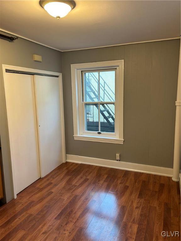 250 Bushkill Street, Unit 2 Easton, PA 18042 - Photo 4 of 6 an empty room with wooden floor and windows