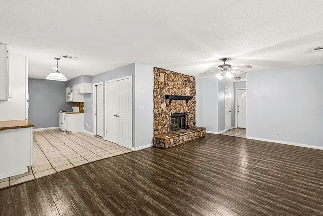 a view of an empty room and window
