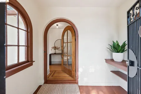 a potted plant sitting on a table in front of a window