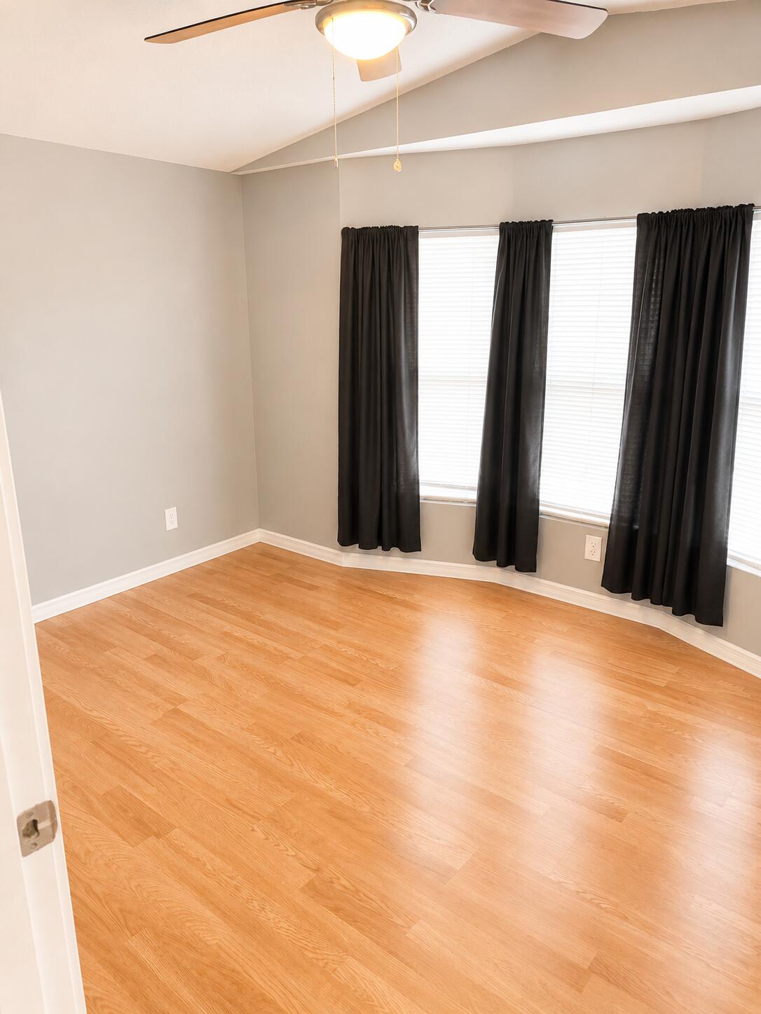 2547 Chatham Way Northeast Palm Bay, FL 32905 - Photo 22 of 24 a view of empty room with wooden floor