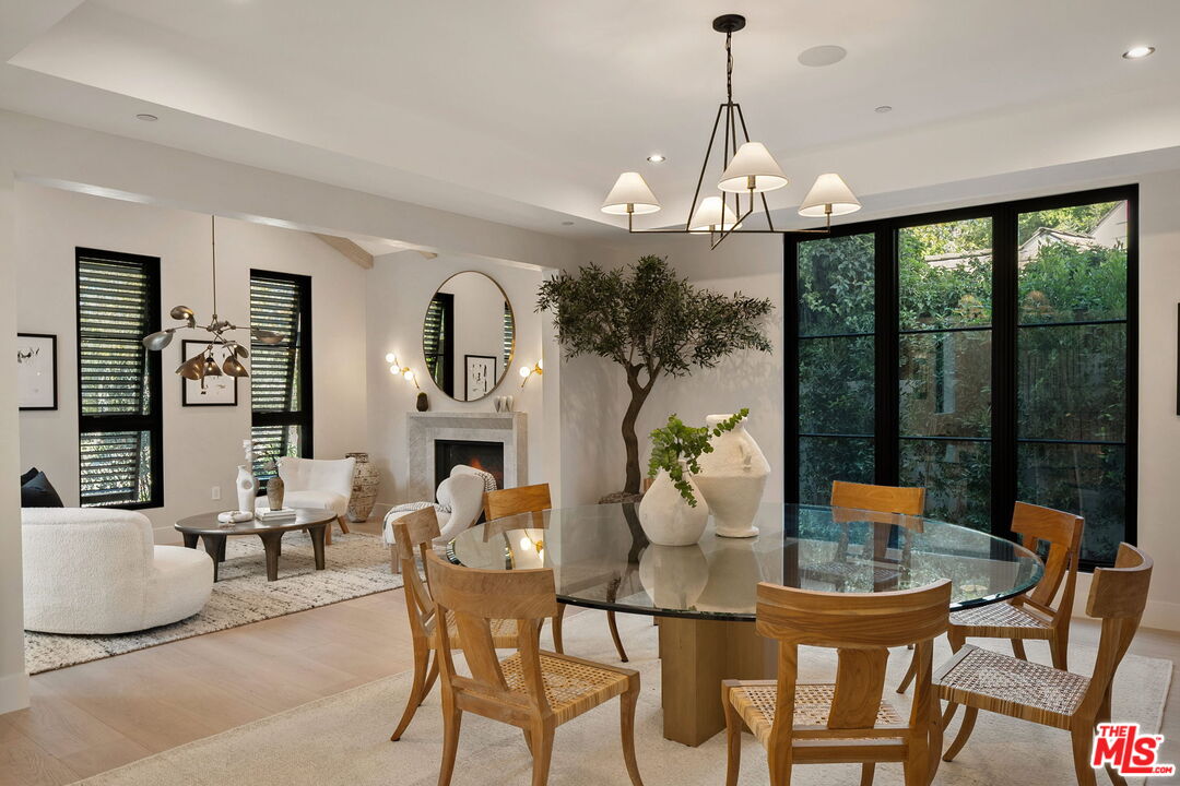 10444 Charing Cross Road Los Angeles, CA 90024 - Photo 19 of 74 a view of a dining room with furniture window and outside view