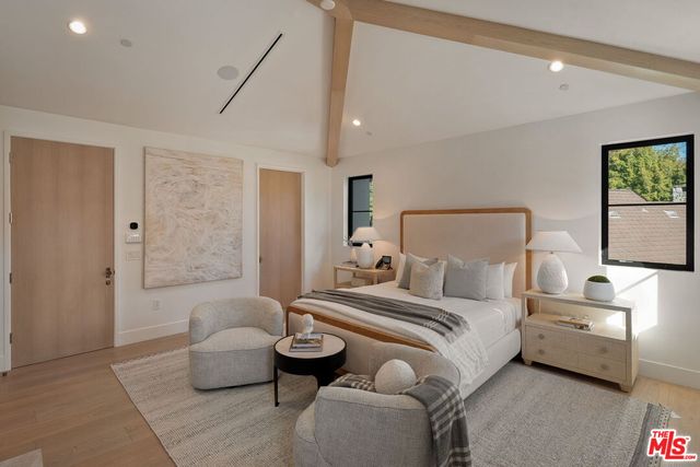 a dining room with stainless steel appliances kitchen island a table and chairs