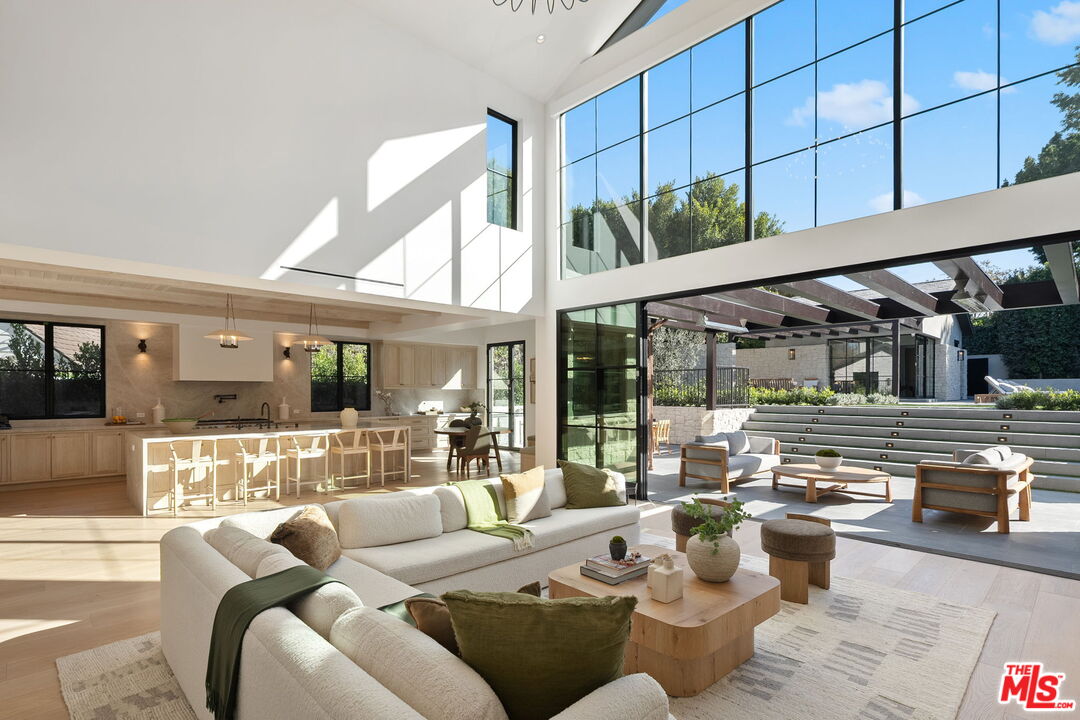 10444 Charing Cross Road Los Angeles, CA 90024 - Photo 8 of 74 a living room with furniture and a large window