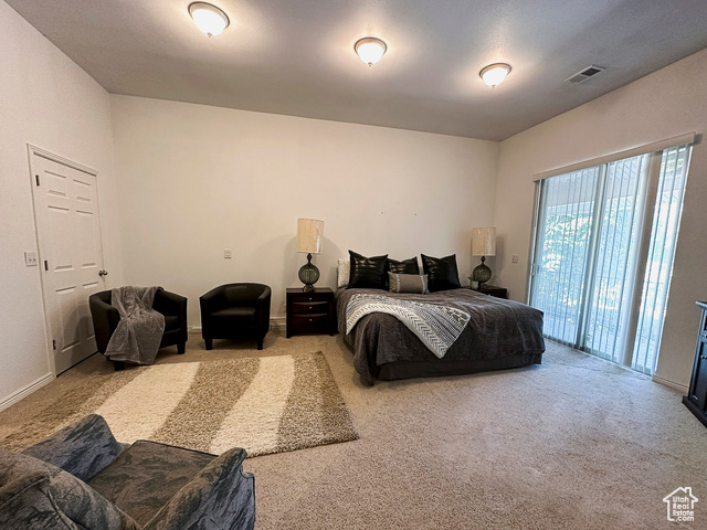 2855 South 1000 West Perry, UT 84302 - Photo 85 of 142 ADU - Master Bedroom with carpet flooring and access to the outside