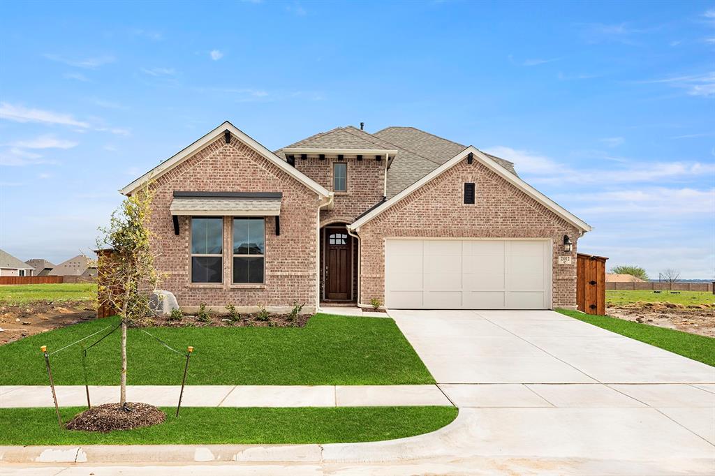 2012 Summer Sky Lane Mansfield, TX 76063 - Photo 1 of 1 a front view of a house with garden