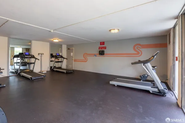 a view of a room with gym equipment