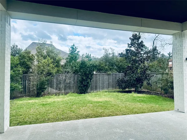 a view of a backyard with a garden