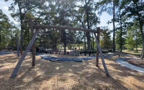 a view of a park with tree s
