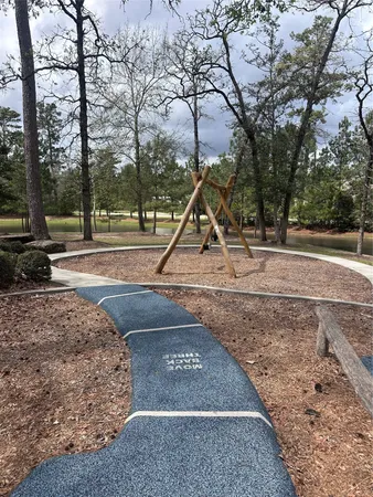 a view of a park with swings