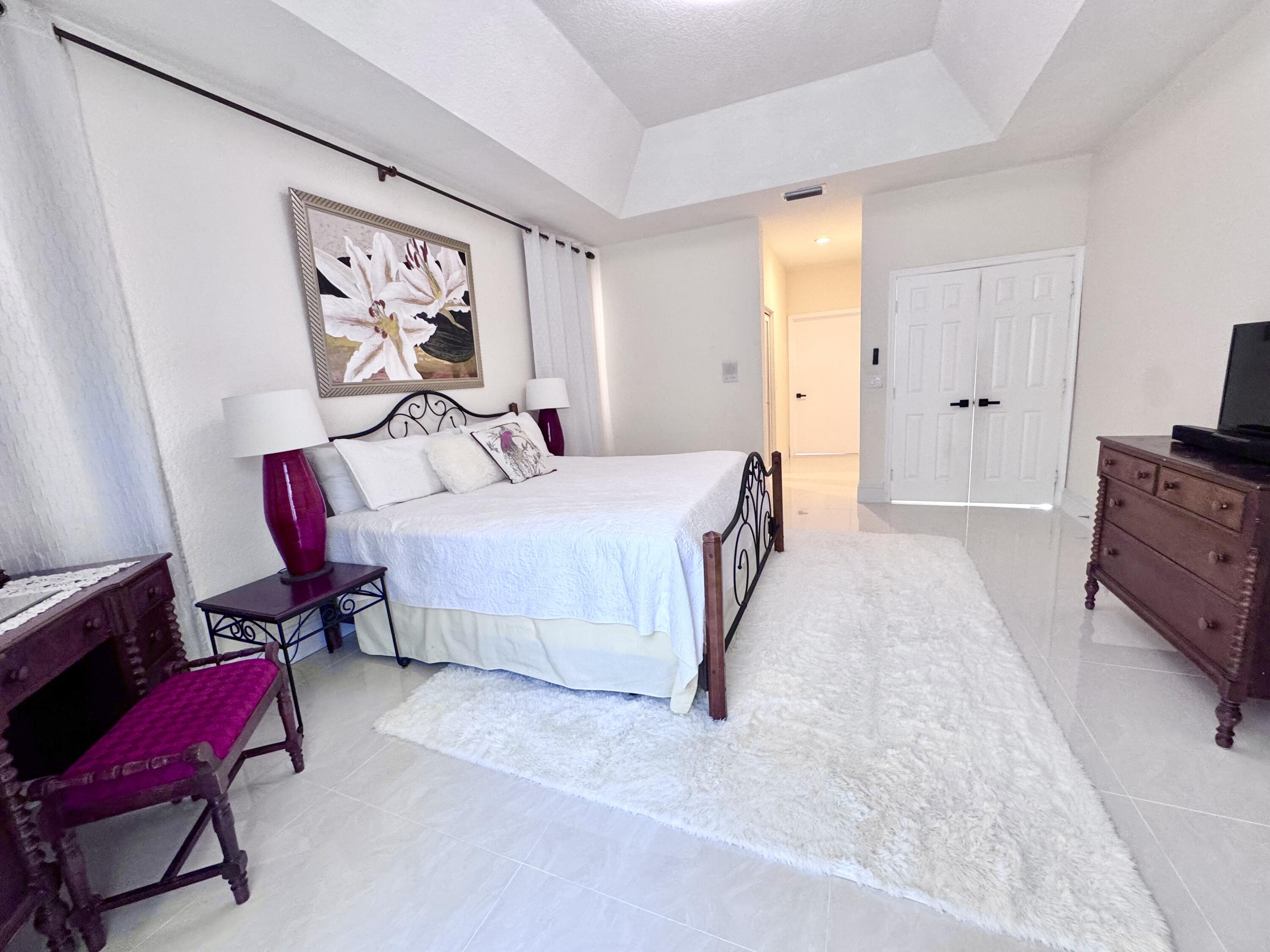 10921 Ravel Court Boca Raton, FL 33498 - Photo 25 of 86 Primary bedroom