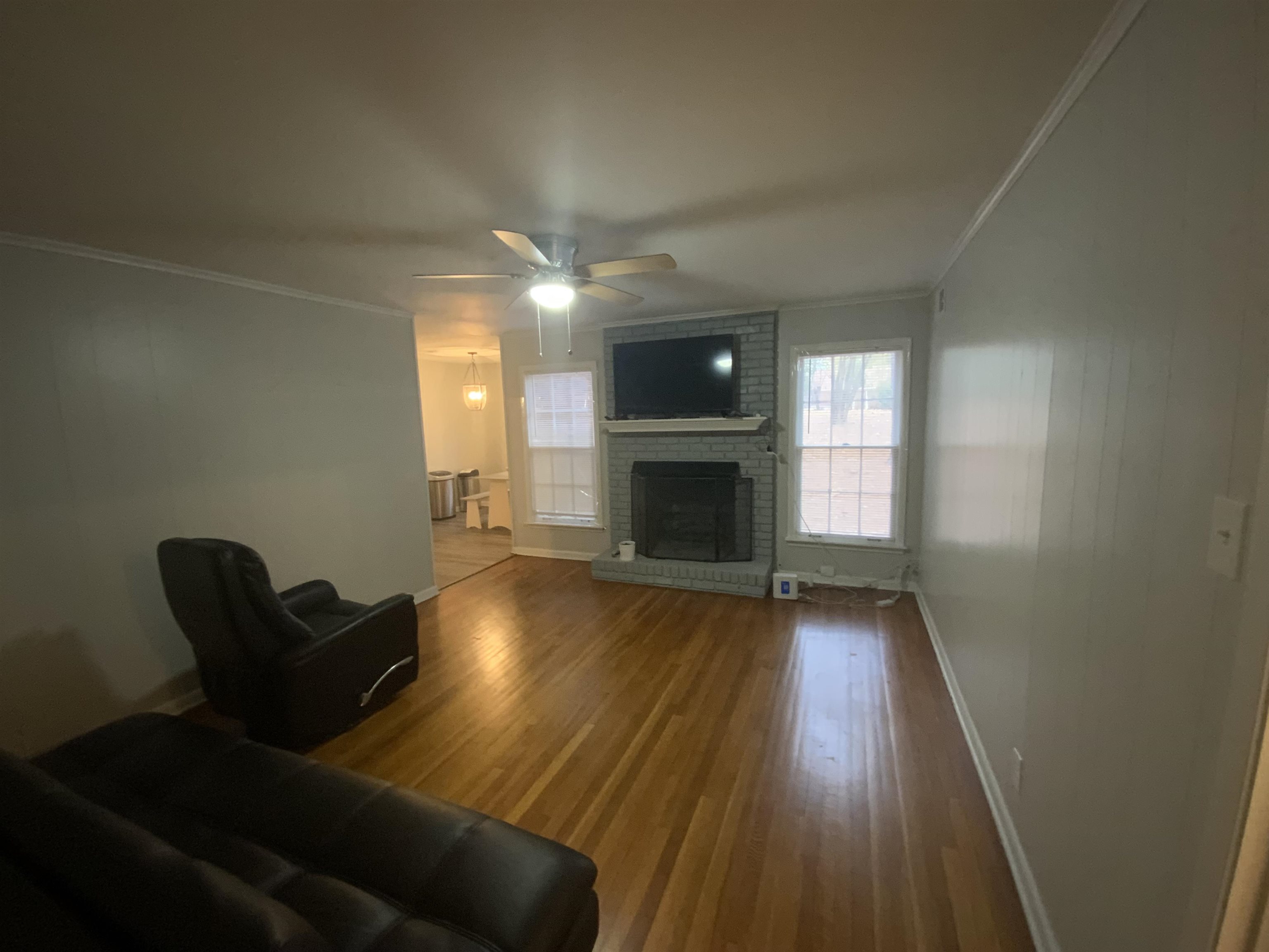 2965 Falkirk Road Memphis, TN 38128 - Photo 15 of 27 a living room with furniture and a fireplace