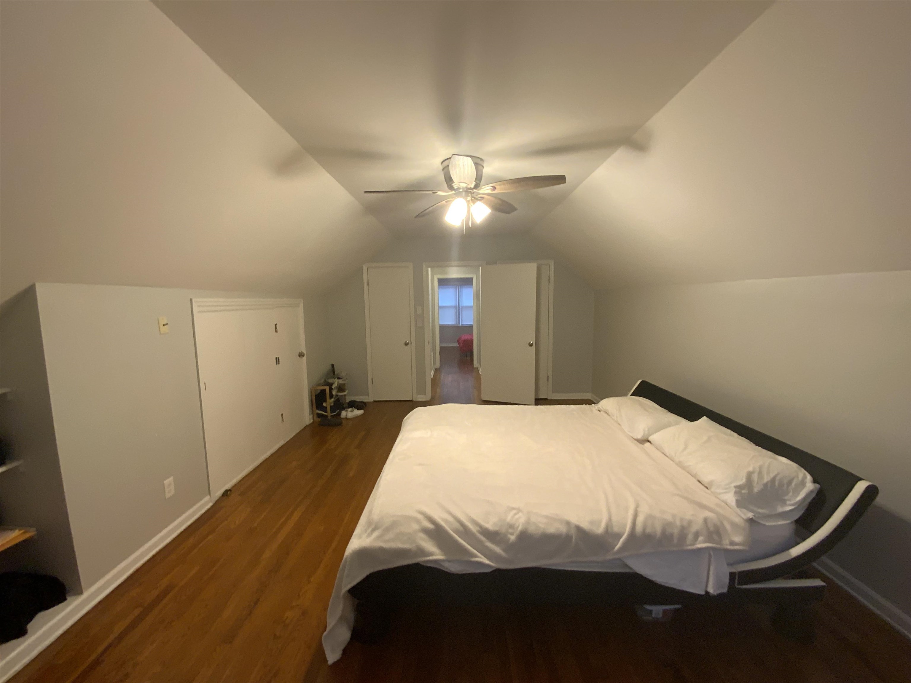2965 Falkirk Road Memphis, TN 38128 - Photo 19 of 27 a bed room with a bed and a chandelier