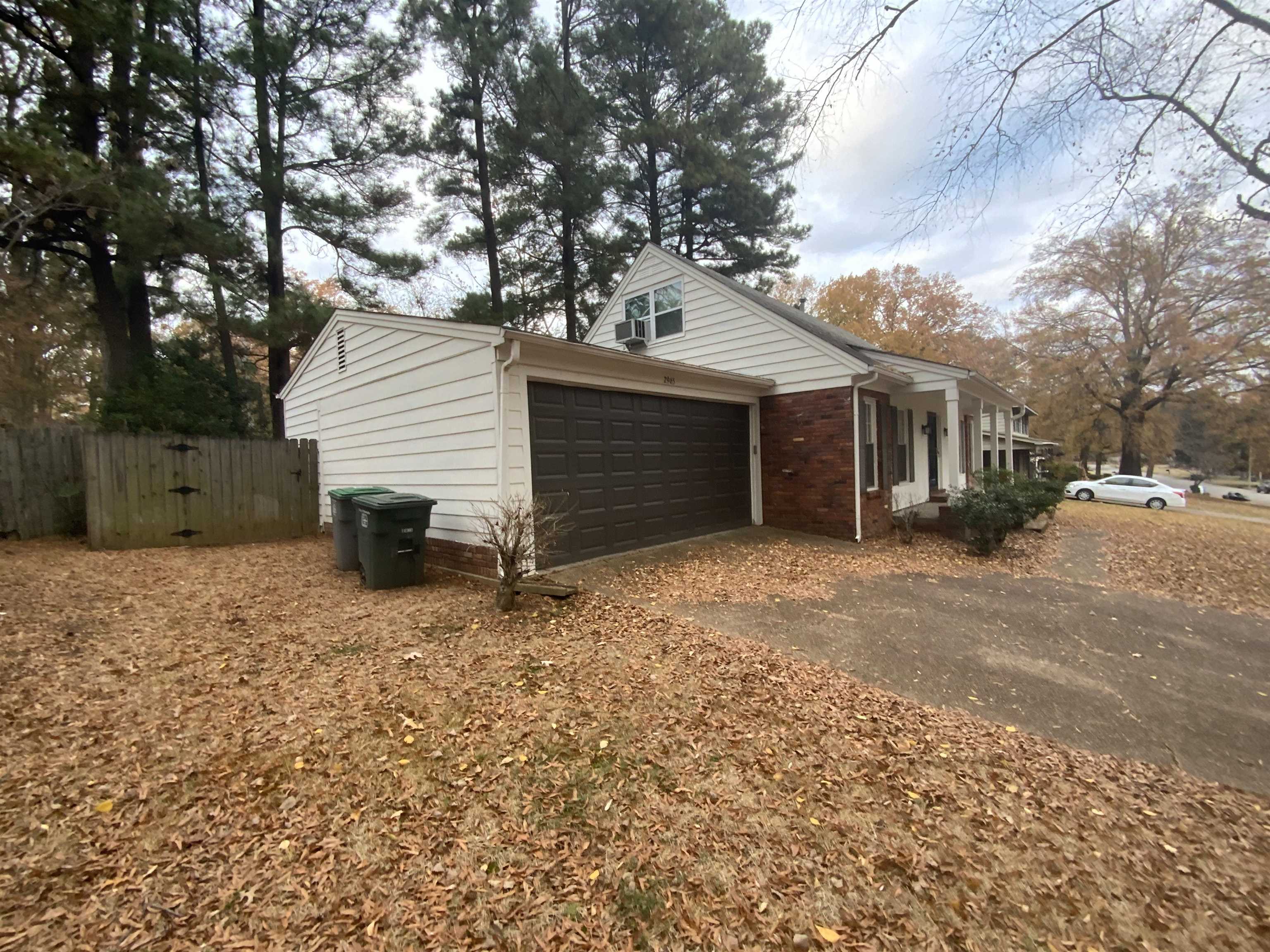 2965 Falkirk Road Memphis, TN 38128 - Photo 21 of 27 a view of a house with a yard