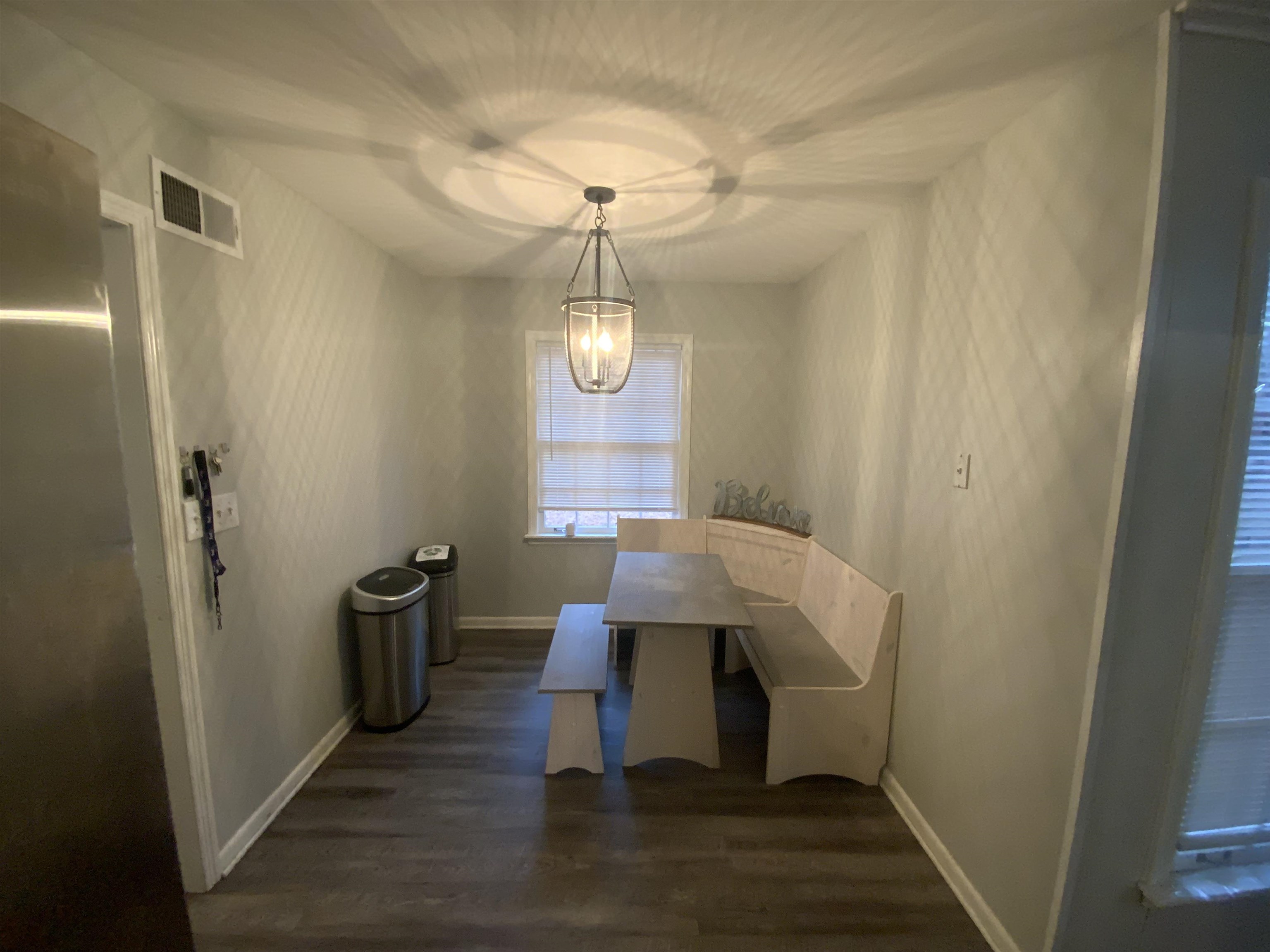 2965 Falkirk Road Memphis, TN 38128 - Photo 4 of 27 a workspace room with wooden floor a sink and staircase