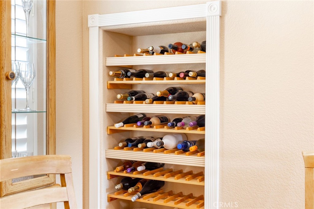 17821 Morning Rock Circle Riverside, CA 92503 - Photo 12 of 47 a shelf with books and knick knacks on it