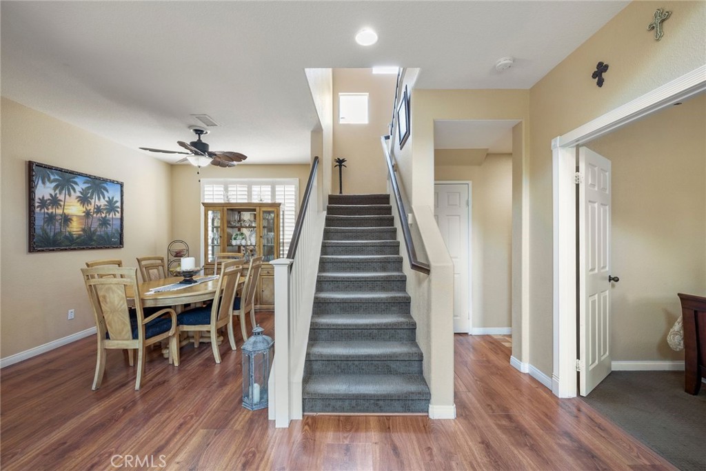 17821 Morning Rock Circle Riverside, CA 92503 - Photo 20 of 47 a view of a dining room with furniture and wooden floor